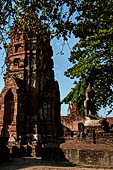 Ayutthaya, Thailand. Wat Mahathat, detail of a small vihara with a chedi and a Buddha image near the eastern side of the eclosure. 